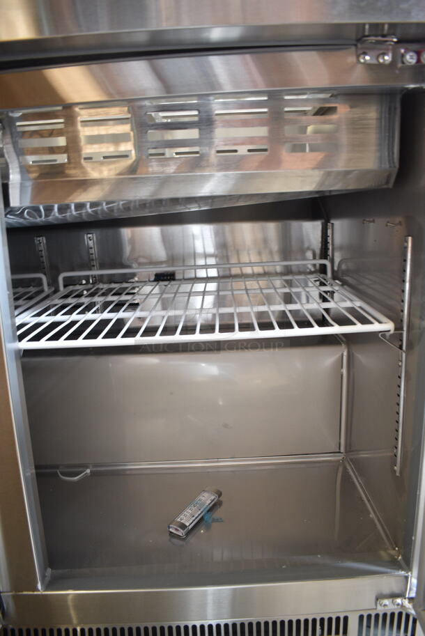 BRAND NEW SCRATCH AND DENT! 2024 Avantco 178SSCFT72HC Stainless Steel Commercial Refrigerated Salad Bar / Cold Food Table on Commercial Casters. 115 Volts, 1 Phase. Tested and Working! - Image 9 of 12