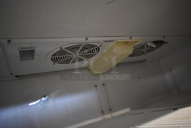 2012 True TG2R-2S ENERGY STAR Stainless Steel Commercial 2 Door Reach In Cooler w/ Poly Coated Racks on Commercial Casters. 115 Volts, 1 Phase. Tested and Working! - Image 6 of 8