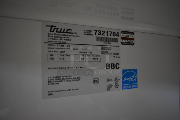 2012 True TG2R-2S ENERGY STAR Stainless Steel Commercial 2 Door Reach In Cooler w/ Poly Coated Racks on Commercial Casters. 115 Volts, 1 Phase. Tested and Working! - Image 7 of 8