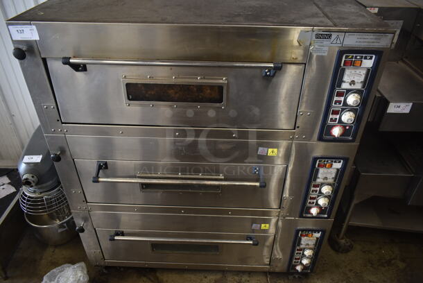 Stainless Steel Commercial Electric Powered Triple Deck Bakery Oven Pizza Oven on Commercial Casters. 220 Volts, 1/3 Phase.