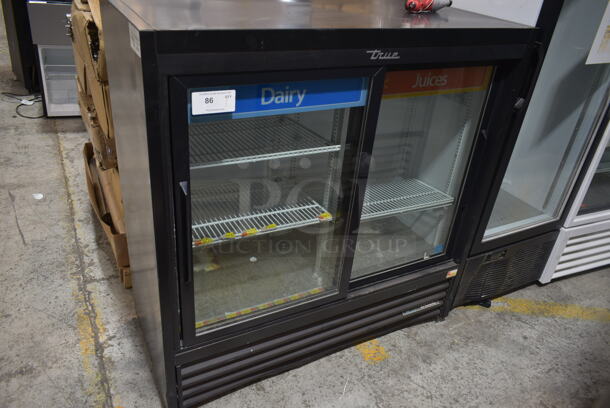 2018 True GDM-41SL-48-HC-LD Metal Commercial 2 Door Reach In Cooler Merchandiser w/ Poly Coated Racks. 115 Volts, 1 Phase. Tested and Working!