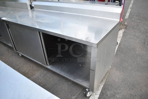 WinHolt Stainless Steel Counter w/ Back Splash, Under Shelf and Doors on Commercial Casters. 