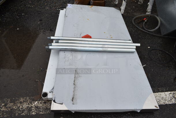 BRAND NEW SCRATCH AND DENT! Regency 600T3060G 30" x 60" 18-Gauge 304 Stainless Steel Commercial Work Table with Galvanized Legs and Undershelf - Image 4 of 5