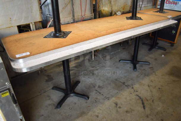 2 White Rectangular Dining Height Table w/ Red and Gray Pattern on 2 Black Metal Base. 95x30x30