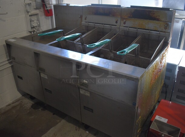 Pitco Frialator Model SG18 Stainless Steel Commercial Natural Gas Powered 2 Bay Deep Fat Fryer w/ Left Side Dumping Station on Commercial Casters. 140,000 BTU. 59x34x47 - Image 1 of 8