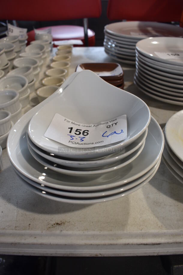 6 Various White Ceramic Bowls. 5.5x6.5x2, 7x8.5x3. 6 Times Your Bid!