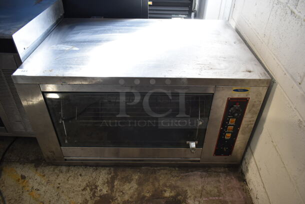 VXO-168 Stainless Steel Commercial Countertop Gas Powered Rotisserie Oven. Tested and Powers On But Does Not Get Cold
 - Image 1 of 6