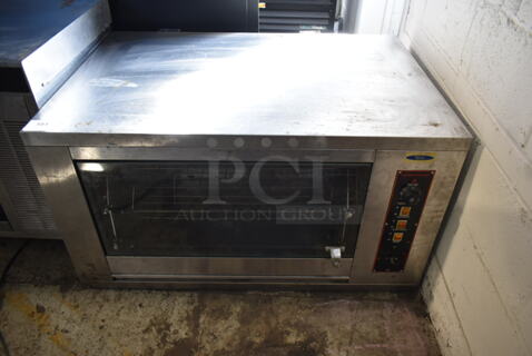 VXO-168 Stainless Steel Commercial Countertop Gas Powered Rotisserie Oven. Tested and Powers On But Does Not Get Cold
