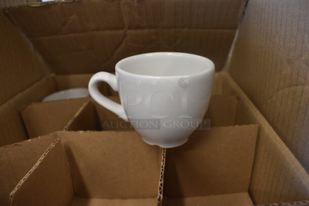 14 BRAND NEW IN BOX! White Ceramic Mugs. 3.5x2.5x2.5. 14 Times Your Bid!