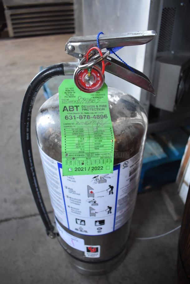 Strike First Wet Chemical Fire Extinguisher. Buyer Must Pick Up - We Will Not Ship This Item. 8x8x23