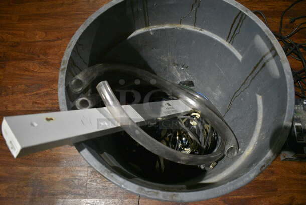 Rubbermaid Brute Gray Poly Trash Can w/ Contents. 25x22x27. (bar) - Image 2 of 3