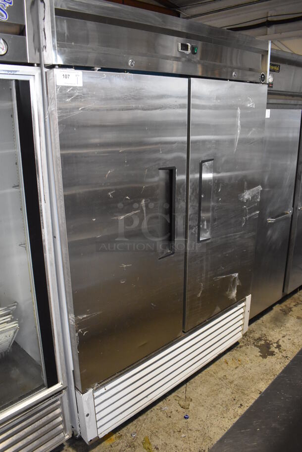 Atena Stainless Steel Commercial 2 Door Reach In Freezer w/ Poly Coated Racks on Commercial Casters. 115 Volts, 1 Phase. 54x32x82. Tested and Does Not Power On