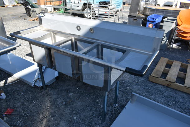 BRAND NEW SCRATCH AND DENT! Regency 600S31416212 Stainless Steel Commercial 3 Bay Sink w/ Dual Drain Boards.  - Image 1 of 6