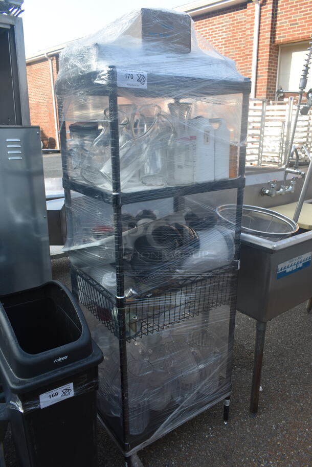 Metal 4 Tier Wire Shelving Unit w/ Contents Including Poly Pitchers. BUYER MUST DISMANTLE. PCI CANNOT DISMANTLE FOR SHIPPING. PLEASE CONSIDER FREIGHT CHARGES. - Image 1 of 6