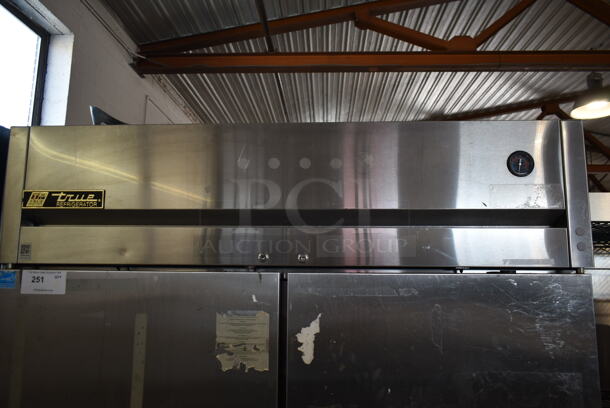 2014 True TG2R-2S ENERGY STAR Stainless Steel Commercial 2 Door Reach In Cooler w/ Poly Coated Racks on Commercial Casters. 115 Volts, 1 Phase. Tested and Working! - Image 2 of 8