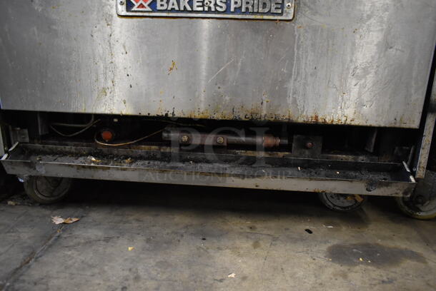 Bakers Pride Stainless Steel Commercial Natural Gas Powered 6 Burner Range w/ Oven and Back Splash on Commercial Casters. - Image 6 of 7