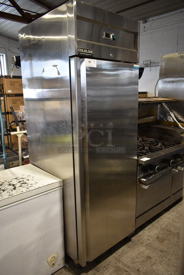Coldline M28F Stainless Steel Commercial Single Door Reach In Freezer w/ Poly Coated Racks on Commercial Casters. 115 Volts, 1 Phase. Tested and Powers On But Does Not Get Cold