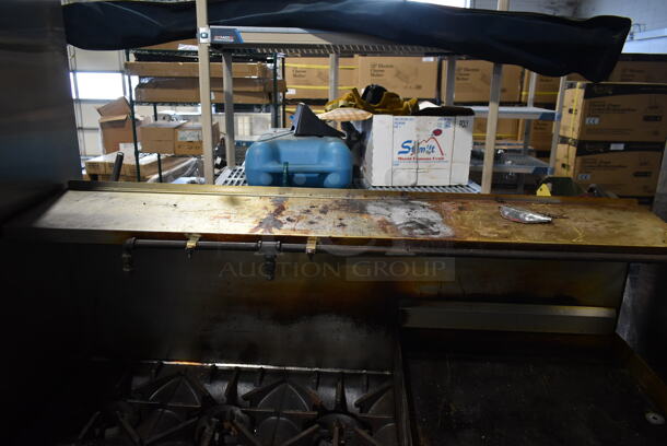 Garland SunFire Stainless Steel Commercial Natural Gas Powered 6 Burner Range w/ Right Side Flat Top Griddle, 2 Ovens, Over Shelf and Back Splash. - Image 4 of 7