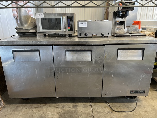 True Model TUC-72 Stainless Steel Commercial 3 Door Undercounter Cooler on Commercial Casters. 115 Volts, 1 Phase. 72x30x35. Tested and Working!