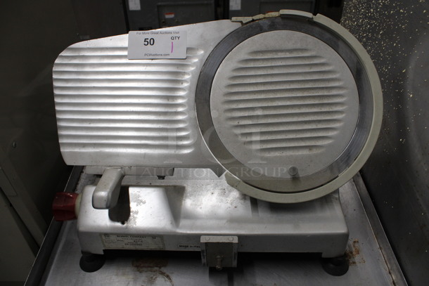 Berkel Model 827-E Metal Commercial Countertop Meat Slicer. Missing Arm and Carriage. 115 Volts, 1 Phase. 22x16x17. Tested and Working!