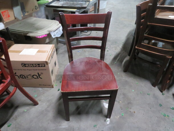 Wooden Chair In A Cherry Finish. 2XBID