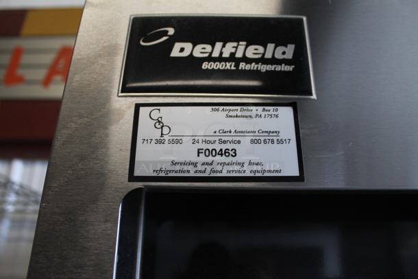 Delfield 6000 XL Stainless Steel Commercial 2 Door Reach In Cooler w/ Poly Coated Racks on Commercial Casters. Tested and Powers On But Does Not Get Cold - Image 5 of 5