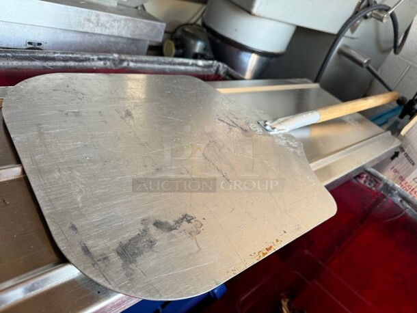 Aluminum Pizza peel with 22" Wooden Handle

 - Image 1 of 3
