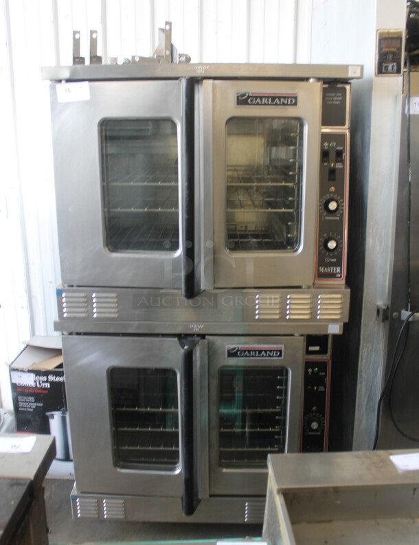 2 2012 Garland MCO-GS-10S Master 200 Stainless Steel Commercial Natural Gas Powered Full Size Convection Oven w/ View Through Doors, Metal Oven Racks and Thermostatic Controls. 60,000 BTU. 2 Times Your Bid! - Image 1 of 11