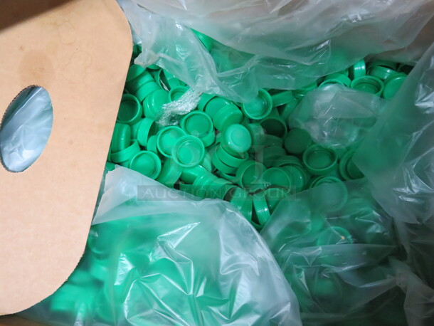 One Open Box Of Green Poly Screw Top Lids. #5144166 - Image 1 of 1