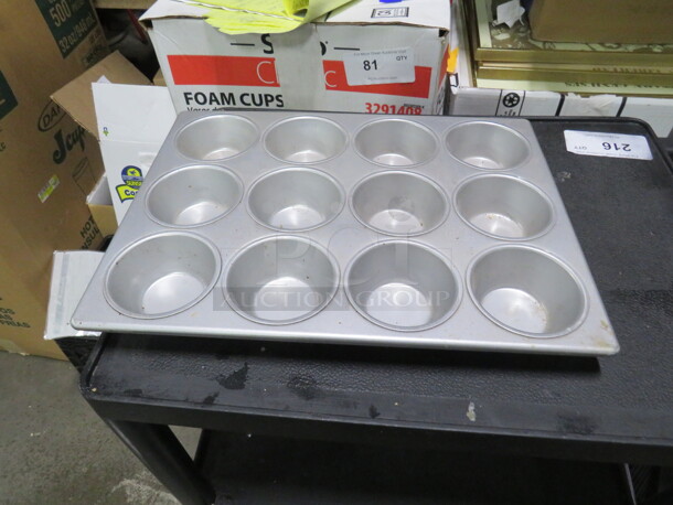 One Commercial 12 Hole Muffin Pan.