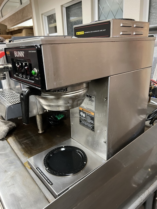 Bunn CW Series  115 volt. This coffee brewer is an excellent addition to any church function, break room, waiting area, or other light duty application where a reliable source of coffee is needed. It brews coffee at optimum temperatures for a rich, consistent product every time. Featuring 1570W of power, this unit allows you to brew up to 60 cups per hour.  Tested & Working! - Image 3 of 3