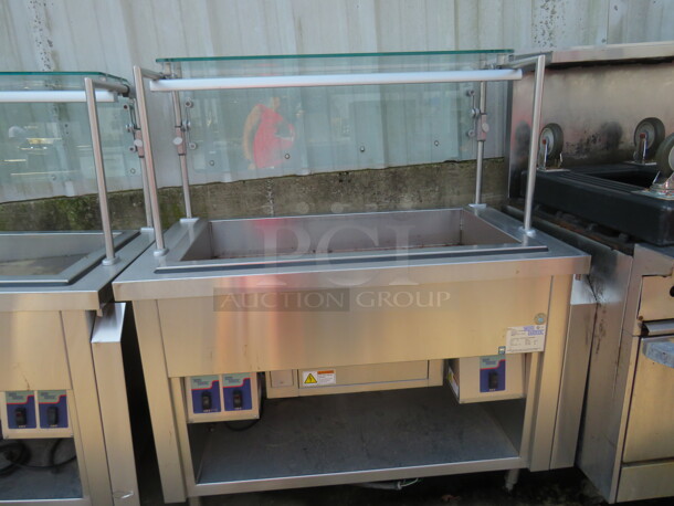 One Stainless Steel Mod U Serve Refrigerated Cold Well, With Sneeze Guards. 120 Volt. Model# MCT-CF3. 51X29X57 - Image 1 of 1