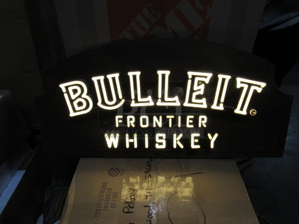 One 32X17 Bulleit Frontier Whiskey Light.