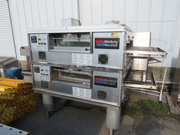 One Double Stack Middleby Marshall Natural Gas Pizza Ovens On Casters. Model# PS555G. 208-240 Volt. 1 Phase. 90X63X62. - Image 1 of 3