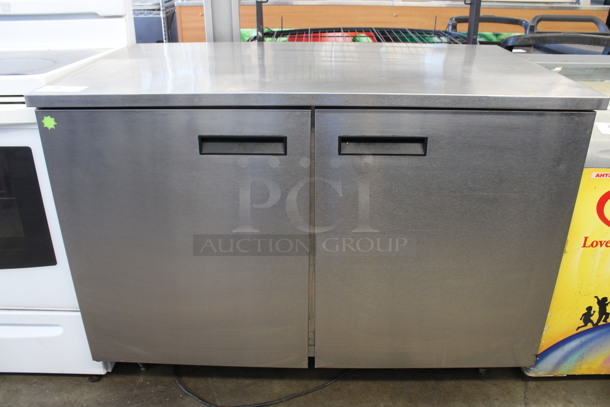 Delfield Model UC4048 Stainless Steel Commercial 2 Door Undercounter Cooler. 115 Volts, 1 Phase. 48x28.5x36. Tested and Powers On But Temps at 50 Degrees