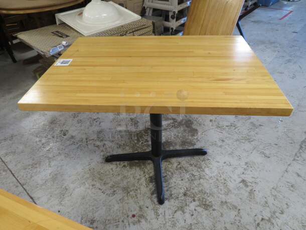 One Solid Wooden Butcher Block Table Top On A Pedestal Base. 42X30X30