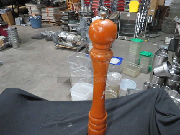 One Wooden Pepper Mill.