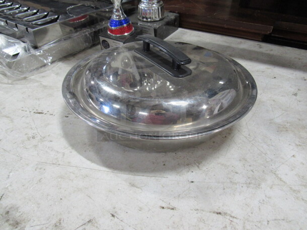 One 14 Inch Stainless Bowl With Lid. 