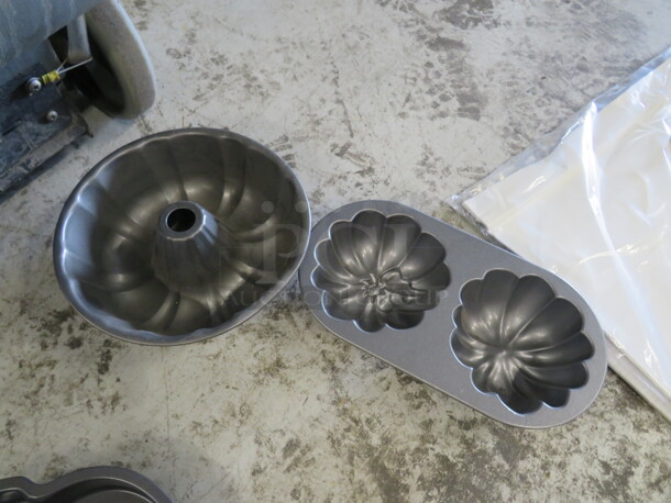 One Lot Of Assorted Bundt Pans. - Image 1 of 1