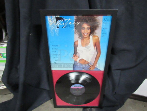 One 14X27 Framed Whitney Houston Vinyl Album. 