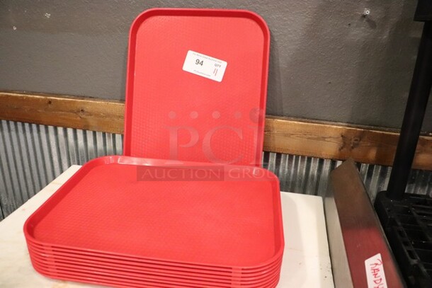 Red Plastic Serving Trays 
17 5/8"x 13 3/4" 
QTY 11
Your Bid x 11  - Image 1 of 1
