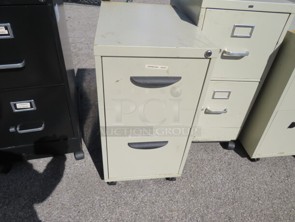 One 2 Drawer Metal File Cabinet On Casters. 15X23X27.5