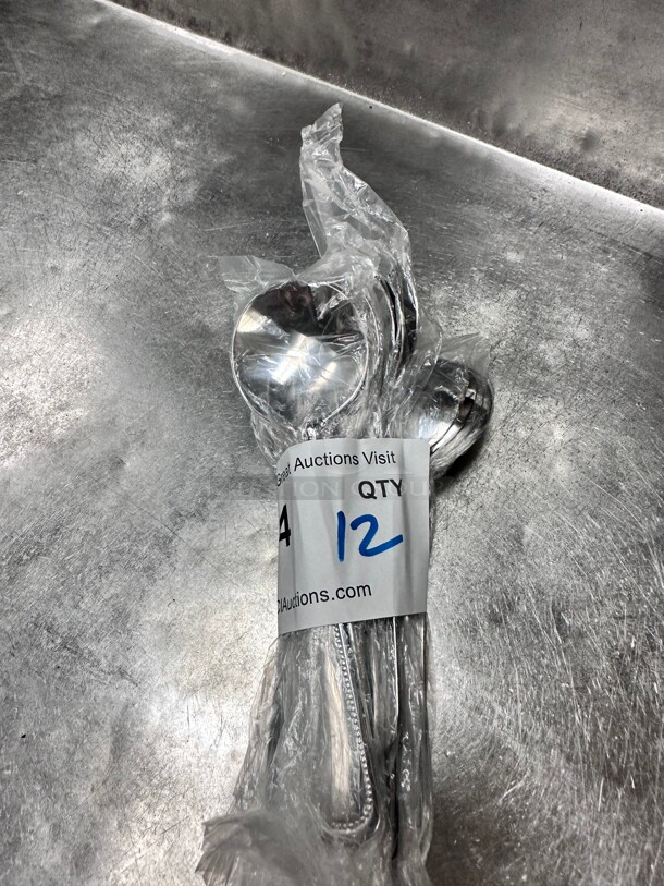 New! Winco  Dessert Spoon with 18/0 Stainless Grade, Dots Pattern NSF  - Image 1 of 3