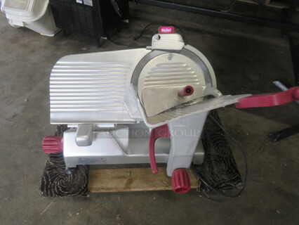 One Berkel 12 Inch Deli Slicer. Model# 827A-Plus. 115 Volt.