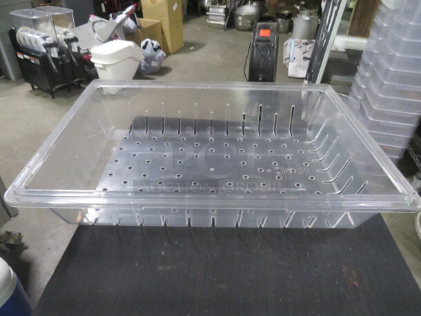 One Cambro 18X26X5.5 Perforated Food Storage Container. 