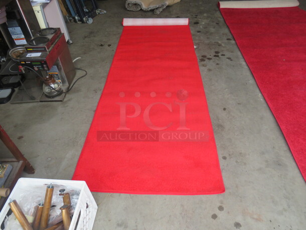 One 116X36 Red Rug.