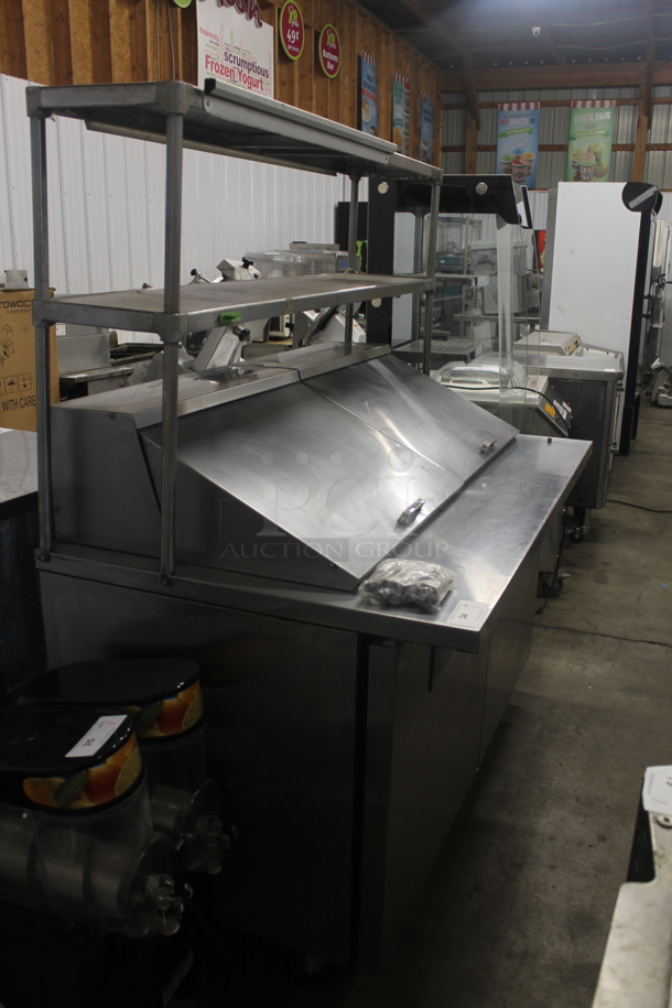 2011 True TSSU-60-24M-B-ST Stainless Steel Commercial Sandwich Salad Prep Table Bain Marie Mega Top w/ 2 Tier Over Shelf on Commercial Casters. 115 Volts, 1 Phase. Tested and Powers On But Does Not Get Cold - Image 2 of 7