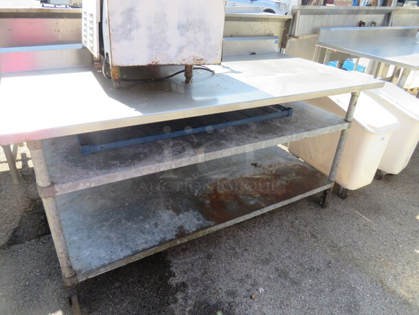 One Stainless Steel Table With Under Shelf On Casters. 72X36X38