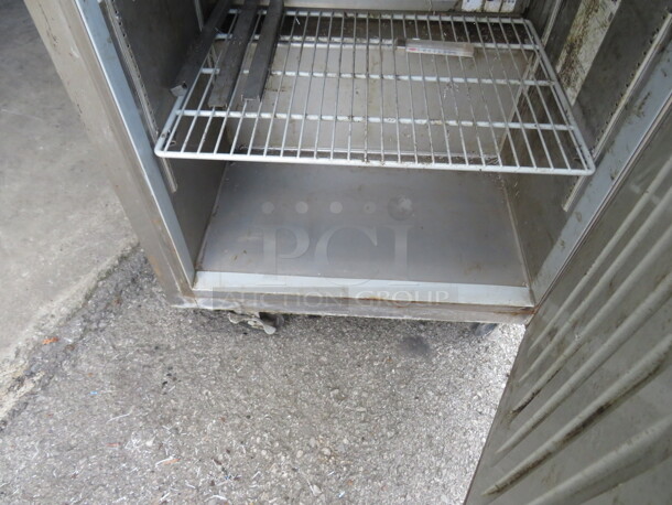 One WORKING Hoshizaki 1 Door Refrigerated Prep Table With 1 Rack, And A Cutting Board On Casters. 115 Volt. Model# CRMR27-8. 27X30.5X44. $3374.00. - Image 2 of 2