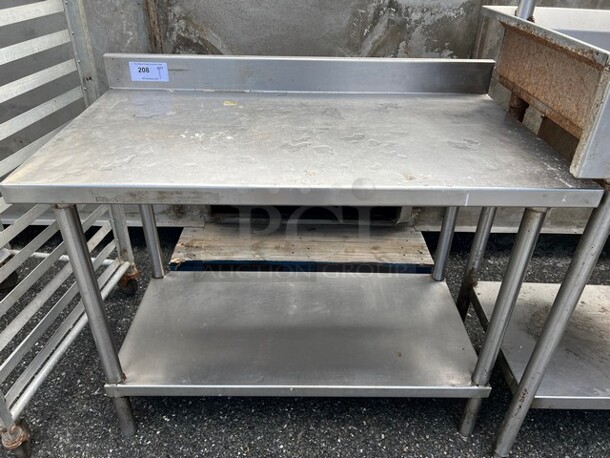 Stainless Steel Commercial Table w/ Under Shelf and Back Splash. 42x24x36.5